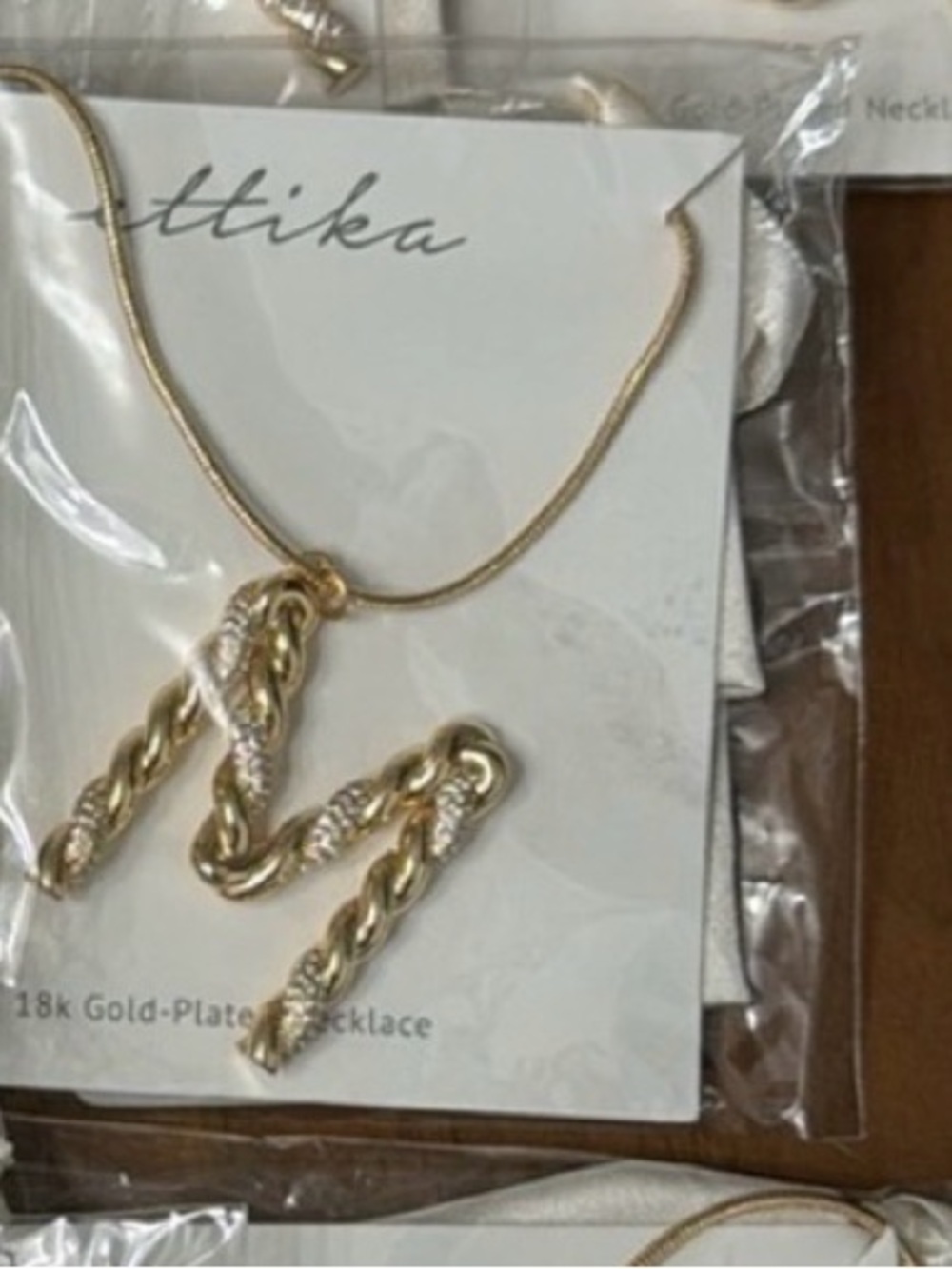 ettika V & M Twisted Bar Pendant Necklace in Shiny Gold - Picture 2 of 2